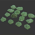 Multiple Green Mountain Models Arranged Around Central Stone With Natural Design
