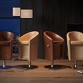 Brown And Beige Leather Bar Stools With Metal Bases In Modern Interior Design