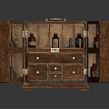 Vintage Wooden Cabinet With Open Doors Drawers And Glass Bottles Inside