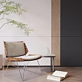 Modern Leisure Chair with Potted Plant Small Round Table Vase and Book on Wooden Floor
