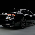 Black Toyota Sedan With Modern Sporty Exterior And Alloy Wheels Design