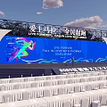 Marathon Event Venue With Blue Backdrop Stage And White Seats