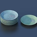 Elegant Dinnerware Set With Multiple Stackable Plates In Green And Blue Hues