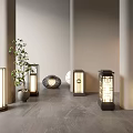 Modern Outdoor Lights With Various Designs In Patio Corridor And Small Plant Warm Glow