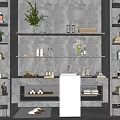 Modern Bathroom Accessories Organized on Concrete Shelves with Towels Toiletries and Green Plants