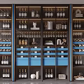 Modern Wine Cabinet With Glass Doors Displaying Wine Bottles Glasses Decorative Items And Blue Drawers