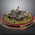 Red and Yellow Flowering Plants in Circular Garden Bed Around Swan Fountain