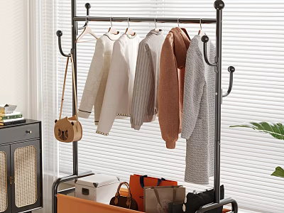 Indoor Garment Rack With Hanging Sweaters Coats And Storage Basket For Bags 3d model