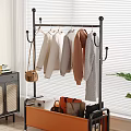 Indoor Garment Rack With Hanging Sweaters Coats And Storage Basket For Bags