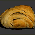 Golden Flaky Baked Puff Pastry Bread With Layered Texture And Shiny Surface