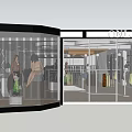 Clothing Store Interior With Hanging Various Colored Garments And Display Racks