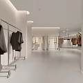 Minimalist Clothing Store Interior With White Walls Light Floor Clothing Racks And Hanging Clothes