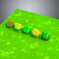 Row of Small Plants in Various Colors Growing on Green Ground Surface