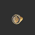 Luxurious Gold Ring With Intricate Engraved Emblem And Blue Gemstones