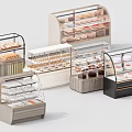 Various Styles Of Glass Door Pastry Display Cases With Assorted Desserts And Cakes