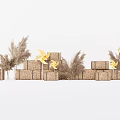 Stacked Golden Gift Boxes With Yellow Pinwheels And Pampas Grass Decorations