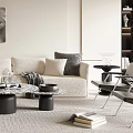 Modern Living Room Interior Design With Sofa Pillows Floor Lamp Neutral Rug And Abstract Art