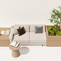 Two Seater Sofa With Gray Brown Cushions Wooden Coffee Table And Green Plant