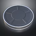 Round Metal Container Lid With Silver Rim And Radial Surface Lines