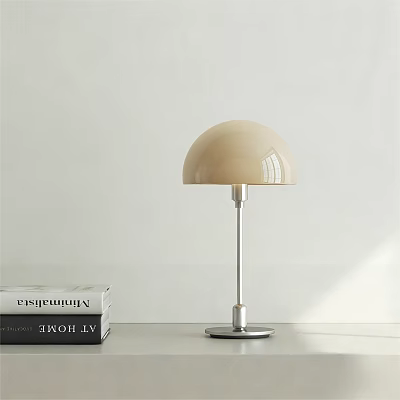 Modern Beige Dome Shaped Table Lamp with Silver Base in Indoor Setting 3d model