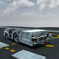 White Utility Vehicle With Large Wheels And Equipment Driving On Open Ground Under Cloudy Sky