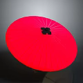 Red Umbrella With Vibrant Red Canopy And Black Center Decoration Displayed
