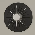 Modern Circular Black Wall Decor With White Center And Radiating Metal Strips
