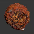Detailed Orange Scaly Pine Cone Structure With Reflective Surface On Dark Background