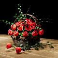 Fresh Red Roses In Decorative Wicker Basket With Green Leaves On Wooden Table Black Background