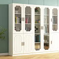 White Bookcase With Glass Doors Wooden Cabinets Books Decorations Green Wall And Wooden Floor
