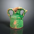 Ancient Carved Green Glazed Ceramic Sculpture With Twisted Handles And Weathered Surface