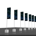 Row of Banner Flags With White Bases Poles and Blue Black Patterns