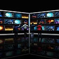 Multiple TVs On Display Wall With People Watching Colorful Dynamic Visuals