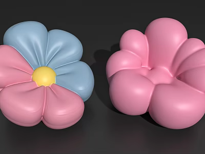 Two Flower Shaped Decorative Items With Pink Blue Petals And Yellow Center 3d model