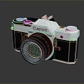 Vintage Canon SLR Camera With Silver Black Body And Classic Lens