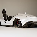 White Sports Car With Open Gull Wing Doors and Sleek Modern Exterior Design