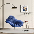 Blue Petal Shaped Leisure Chair With Curved Floor Lamp Side Table Plant And Wall Art