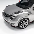 Silver Compact Sports Car Featuring Sporty Design Red Accents And Alloy Wheels