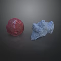 Red And Blue Rockery Stones With Rough Textured Surface And Irregular Shape Design