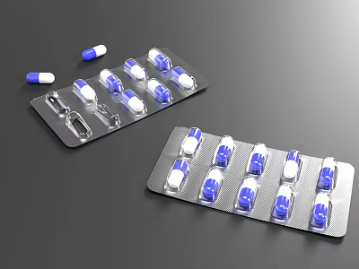 Blue And White Capsules In Blister Packs With Scattered Pills On Dark Surface 3d model