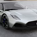 Silver Maserati Sports Car With Sleek Exterior Black Wheels And Logo By Waterfront