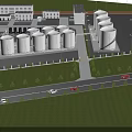 Industrial Plant with Multiple White Storage Tanks Green Lawns Roads and Vehicles