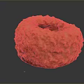 Freshly Baked Orange Donut With Textured Crust And Glossy Finish On Dark Background