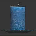 Blue Candle Lamp with Decorative Blue Plate and Wick on Dark Background