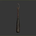 Rustic Handcrafted Wooden Tool With Long Handle Loop Top And Natural Wood Grain