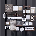 Stylish Wall Art Collage with Various Frames Typography Decor Cross and Hooks on Dark Wall 3d model