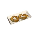 Three Golden Croissants with Black Sesame Seeds on White Rectangular Tray 3d model