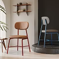 Modern Dining Chair Featuring Brown Upholstered Seat And Red Metal Legs In Minimalist Interior