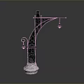 Ornate Wrought Iron Street Lamp With White Stone Base And Decorative Patterns