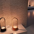 Ornamental Decorative Set With Glass Shades Wooden Black Bases And Candle Light On Display Shelf